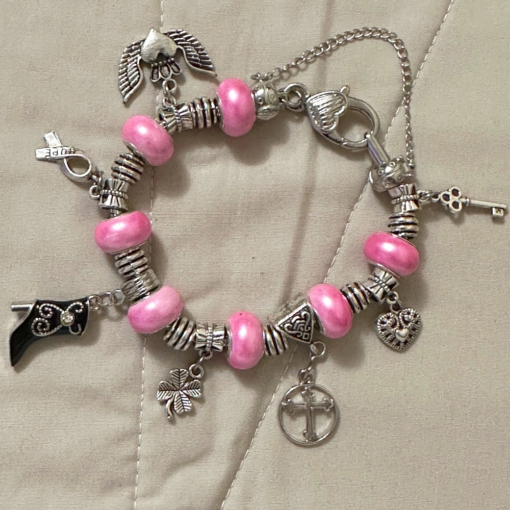 Handmade – NWOT – charm bracelet with bright pink beads and several charms